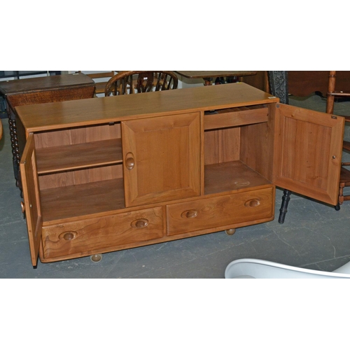 51 - An Ercol Elm 3 door sideboard in excellent condition