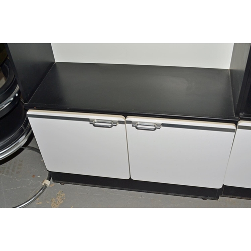 57 - A retro black and white cabinet with chrome fittings - dated 1978 - to match previous lot