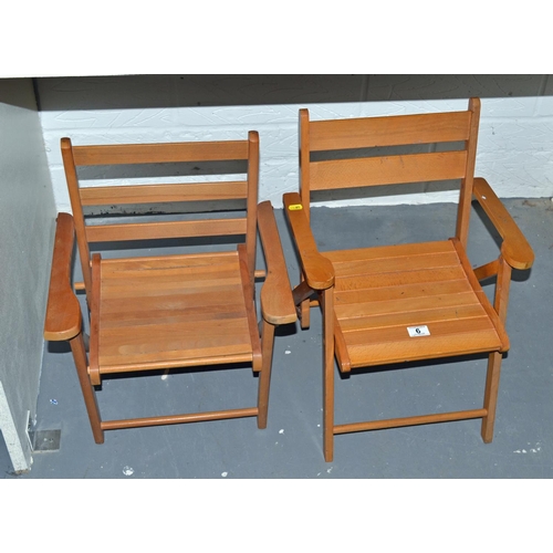 6 - A pair of vintage folding wooden children's chairs