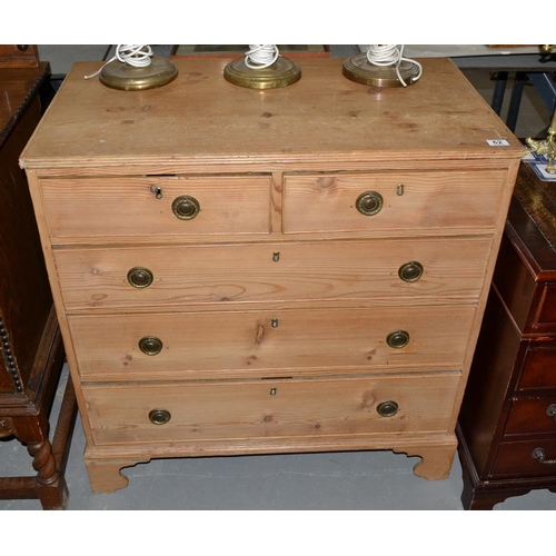 62 - An antique pine 2 over 3 chest of drawers standing on bracket feet