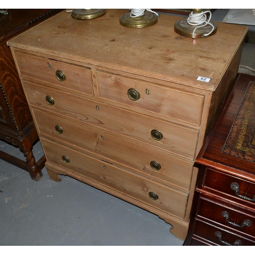 62 - An antique pine 2 over 3 chest of drawers standing on bracket feet