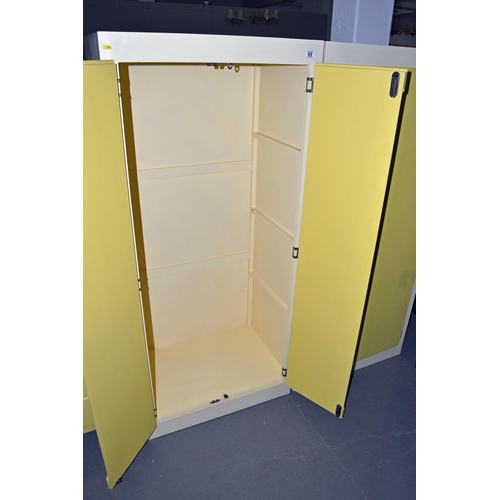 69 - A retro yellow and cream painted wardrobe