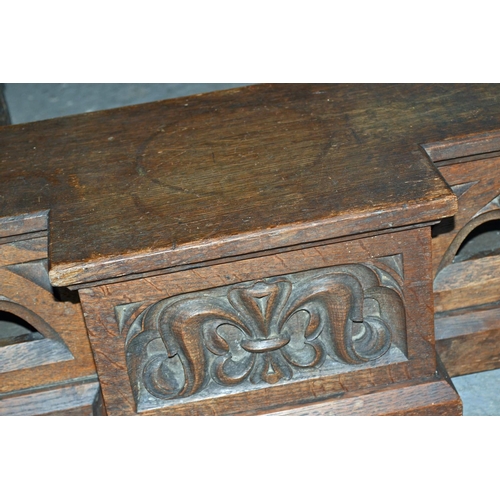 71 - A large antique carved Oak mantelpiece in the Gothic style