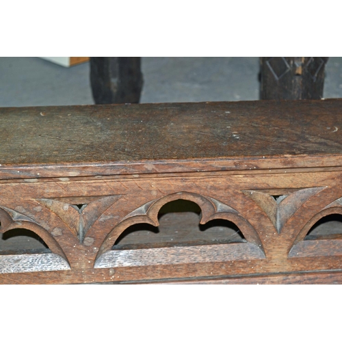 71 - A large antique carved Oak mantelpiece in the Gothic style