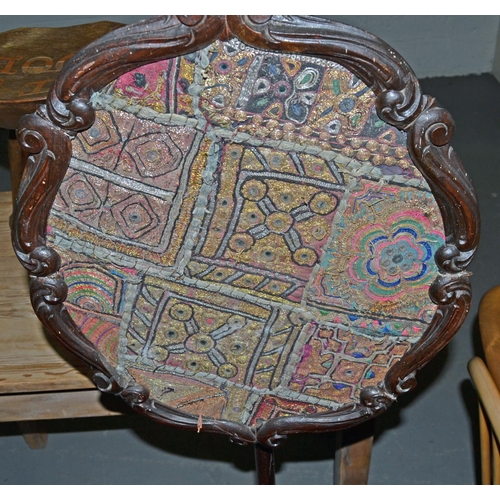 74 - A Victorian Mahogany pole screen with needlework panel