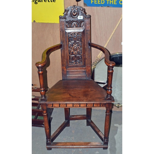 95 - An unusual antique carved oak corner chair