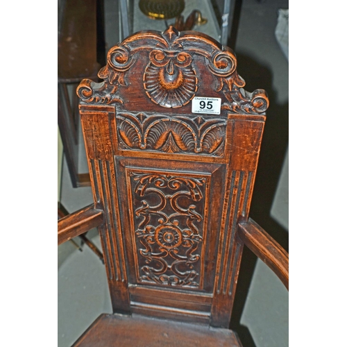 95 - An unusual antique carved oak corner chair