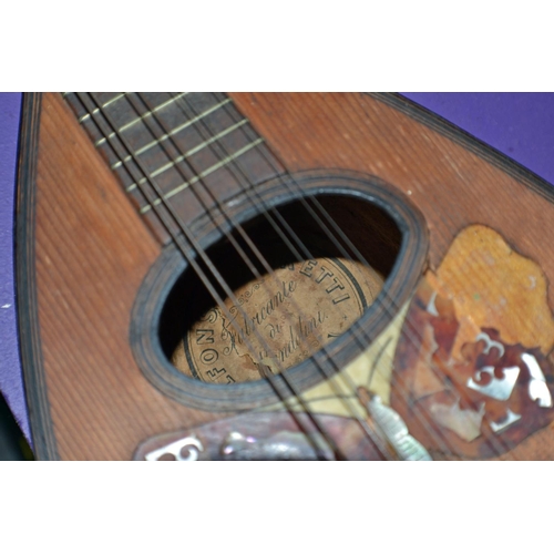 119 - An antique Mandolin by Alfonso Moretti of Italy