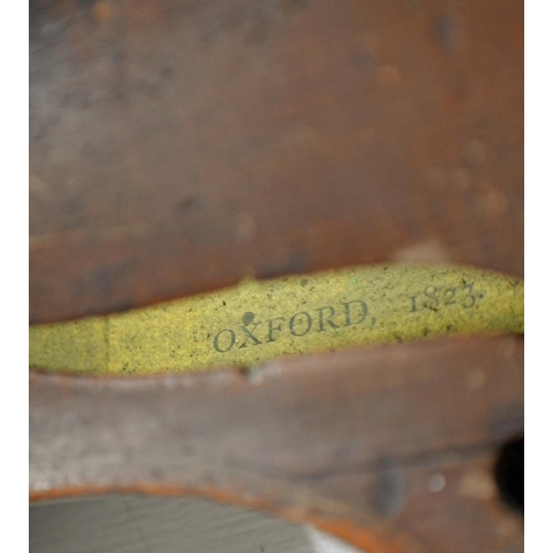 127 - An antique violin bearing a label for Charles Harris of Oxford 1823