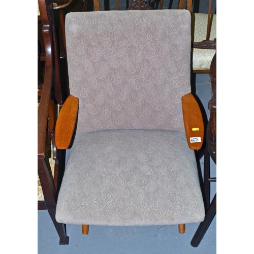 16a - A retro armchair with wooden arms