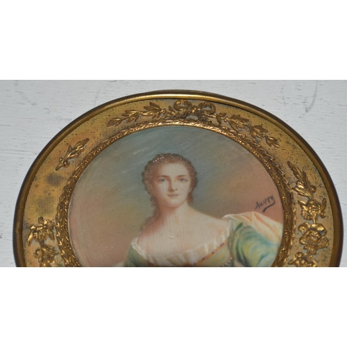 284 - A gilt framed miniature of a Regency lady signed Auvry with details verso - likely 19th century