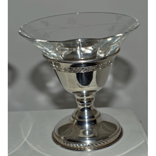 637 - A pair of Canadian silver Sherbets or Champagne glasses with silver stems and engraved glass inserts... 