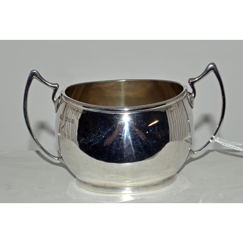 638 - A silver 2 handled sugar bowl with armorial - London 1929 by Carrington & Co