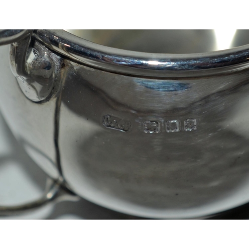 638 - A silver 2 handled sugar bowl with armorial - London 1929 by Carrington & Co