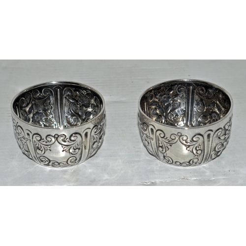 639 - A pair of miniature silver embossed bowls - London 1891 by Charles Edwards