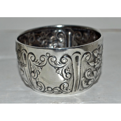 639 - A pair of miniature silver embossed bowls - London 1891 by Charles Edwards