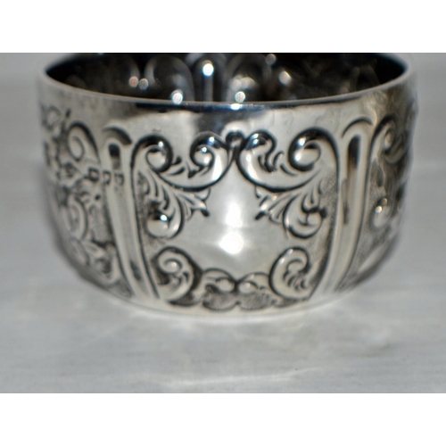 639 - A pair of miniature silver embossed bowls - London 1891 by Charles Edwards