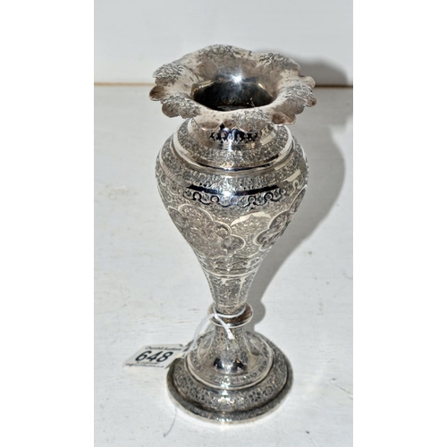 648 - An Arabic/ Indian white metal vase of bulbous form with highly embossed design c.1900