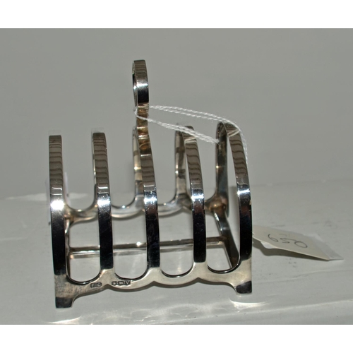 650 - A silver 4 slice toast rack - Sheffield 1938 by Frank Cobb