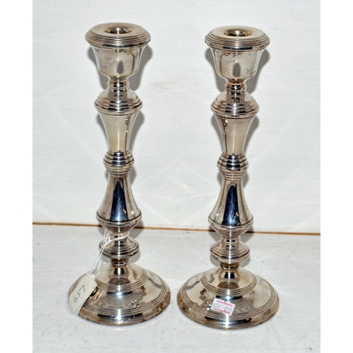 657 - A large pair of silver candlesticks - Birmingham 1950 by Broadway & Co