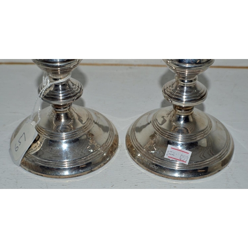 657 - A large pair of silver candlesticks - Birmingham 1950 by Broadway & Co