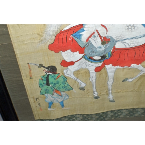 205 - A large Japanese printed scroll in frame showing a warrior on horseback - signed