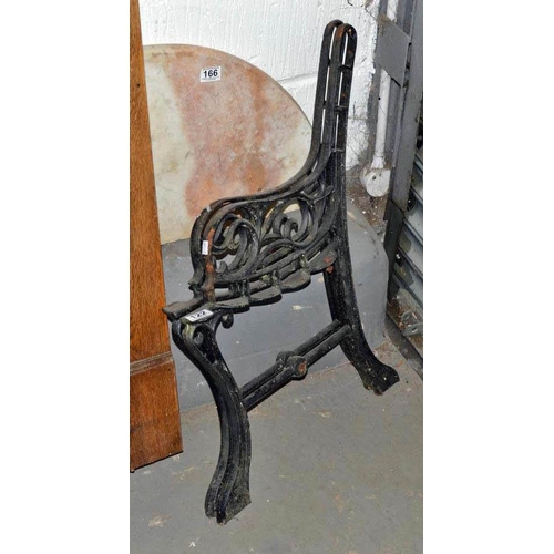 122 - Pair of cast iron bench ends