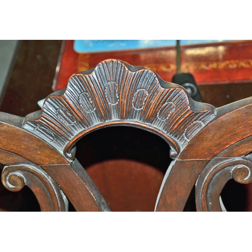 45 - An Antique carver arm chair with quality carving and 