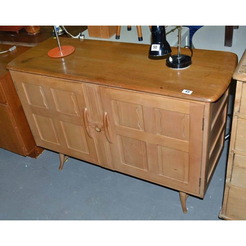 49 - An unusual vintage Blonde Ercol sideboard on splayed feet