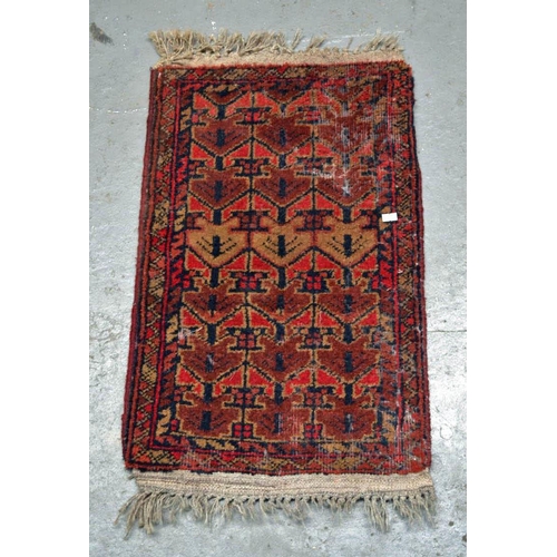 4 - A small red ground prayer rug