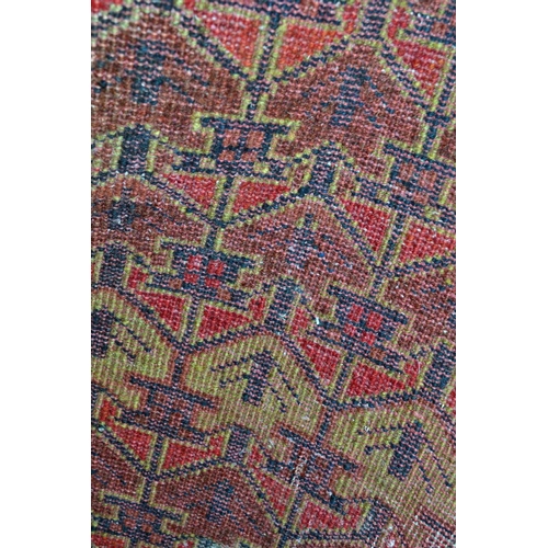 4 - A small red ground prayer rug