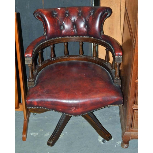 48 - Ox Blood red leather captains chair