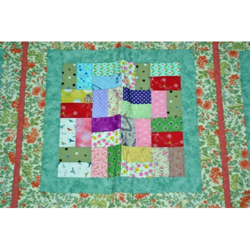 6 - A good quality patchwork quilt - signed and dated by the maker