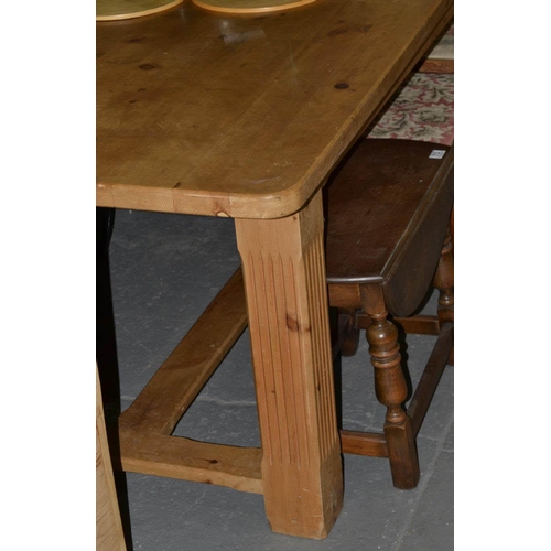 70 - A large pine refectory table - approx 7ft long