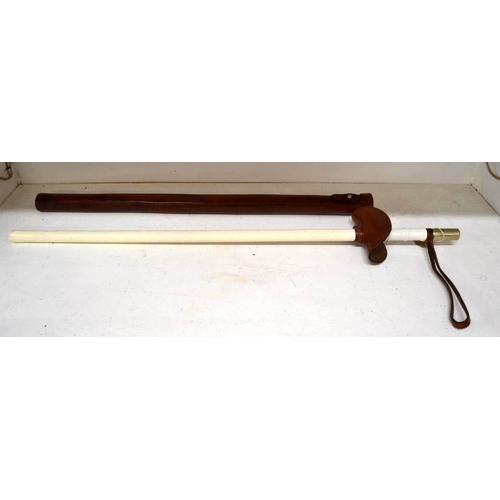 710 - An unusual vintage mounted police baton in leather sheath - likely Metropolitan Police