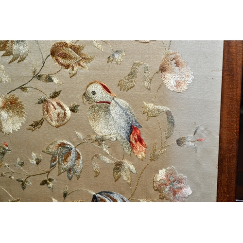 102 - Vintage fire screen containing an antique silkwork panel of parrots