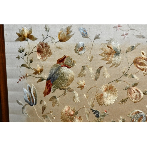 102 - Vintage fire screen containing an antique silkwork panel of parrots