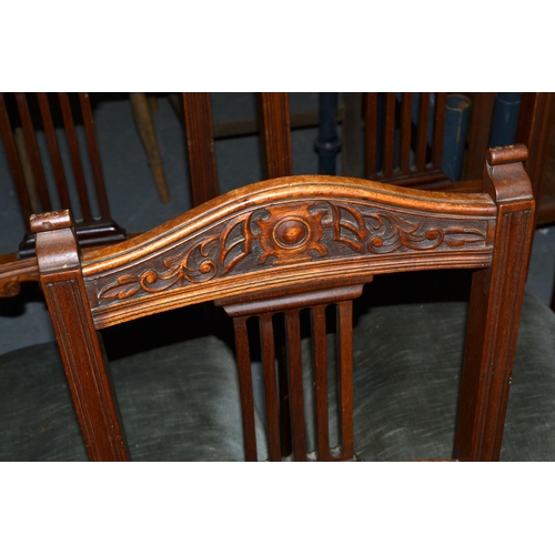 11 - 6 antique dining chairs with carved details