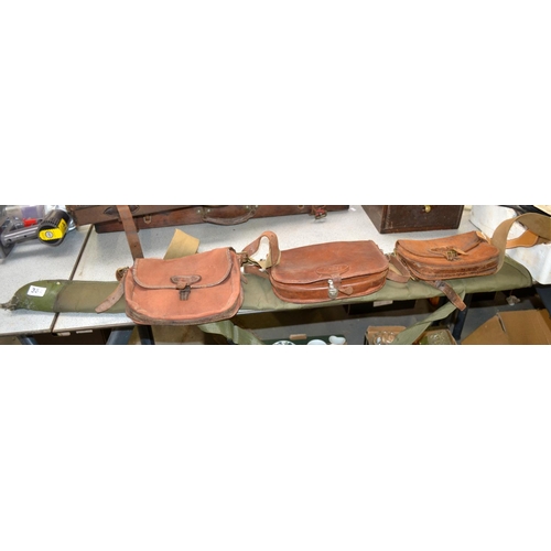 384 - 3 leather cartridge bags and a gun slip