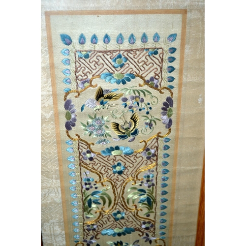 222 - A vintage oriental silkwork panel depicting a Peacock - probably Chinese