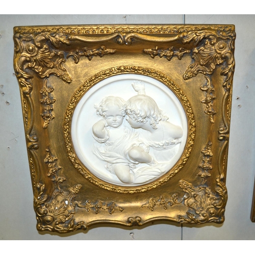 230 - 3 highly decorative classical style plaques in gilt frames