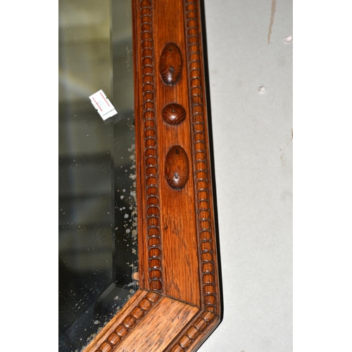 266 - Oak framed octagonal mirror