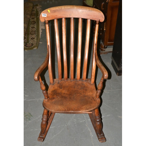 116 - Antique elm seated slat back rocking chair