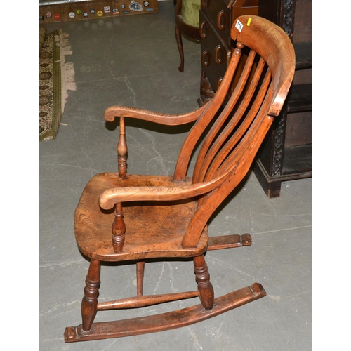 116 - Antique elm seated slat back rocking chair