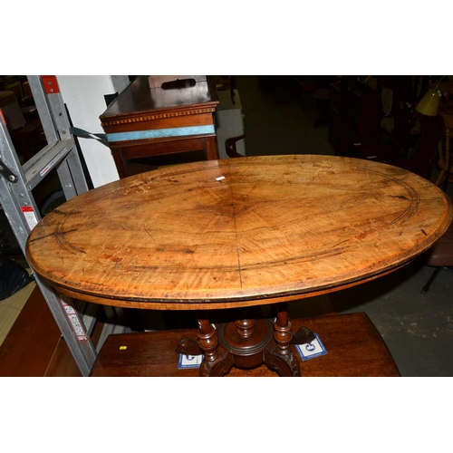 151 - A Victorian walnut oval side table