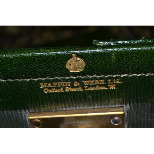 164 - An antique green Moroccan leather Mappin & Webb travelling case with some contents