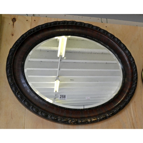 258 - A vintage wooden framed mirror