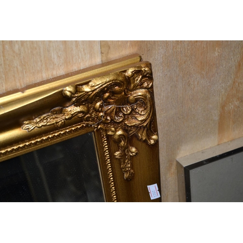 262 - A large gilt framed mirror