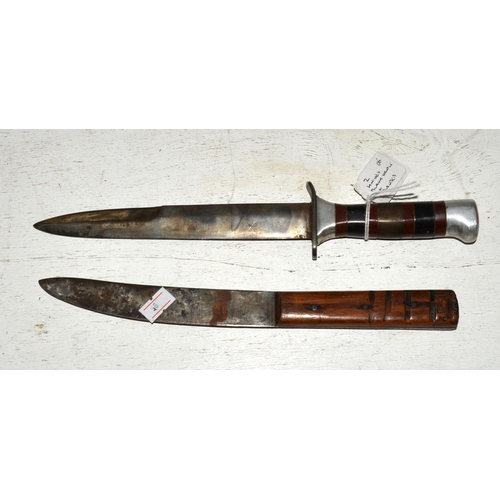 558 - 2 knives - one with stacked leather handle