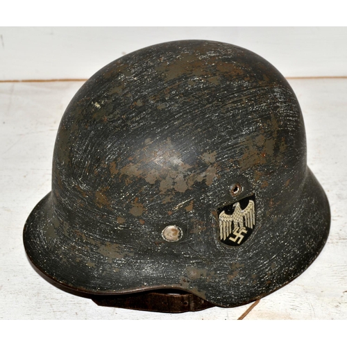 591 - A WW2 German Double Decal helmet with original 1938 ink stamp on liner